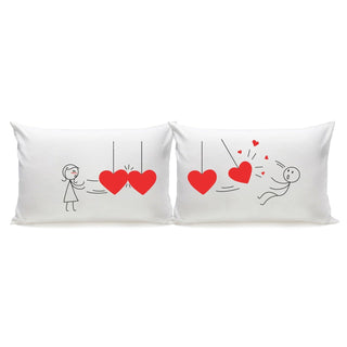 Cute pillow design featuring Newton's Cradle love gifts with hearts and playful characters
