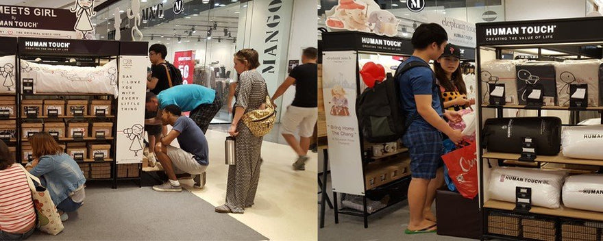 Customers exploring the Human Touch heartfelt gifts for couples review in a retail store setting