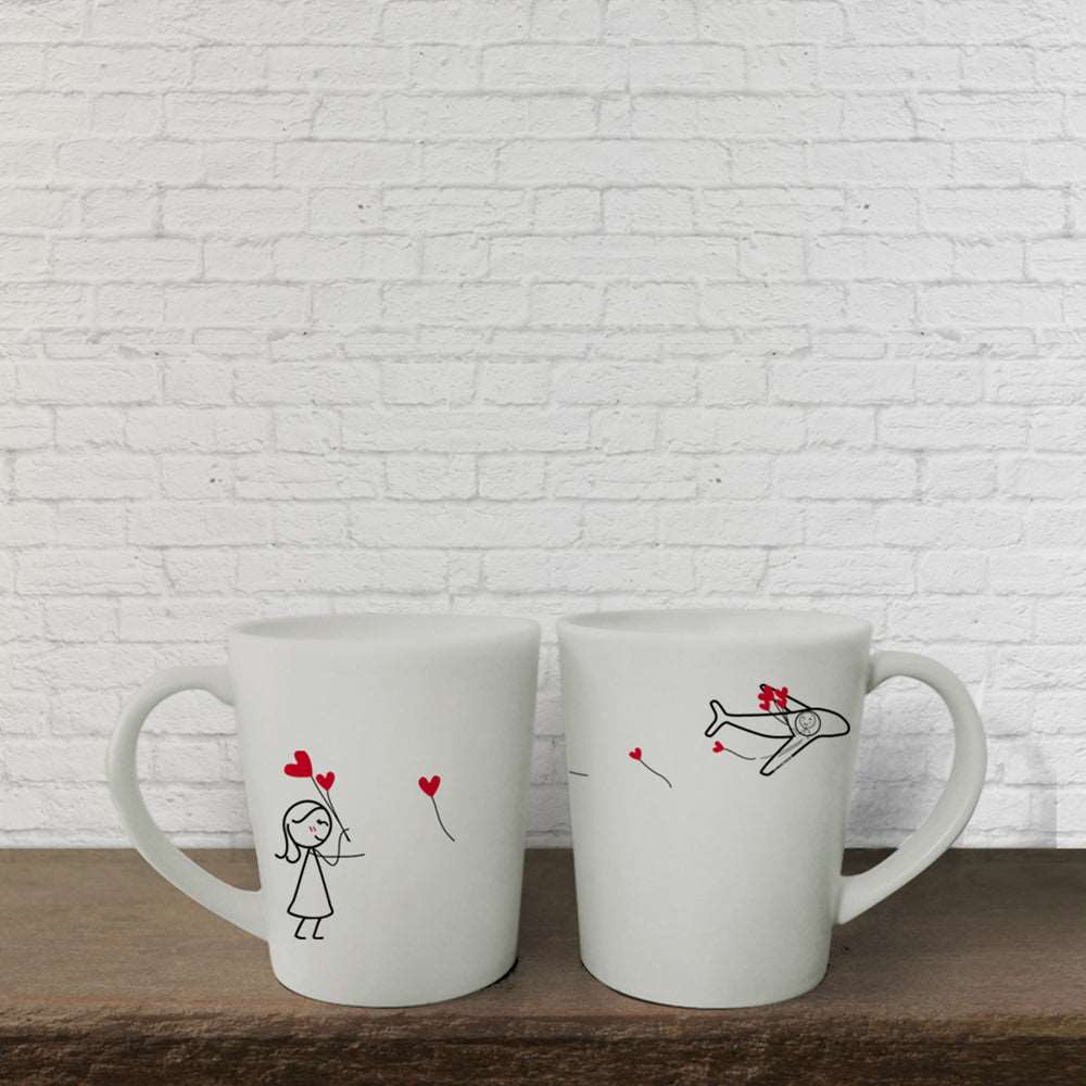 Celebrate love with unique hand-drawn designs on these delightful white mugs, perfect for couples anniversaries or as thoughtful gifts.
