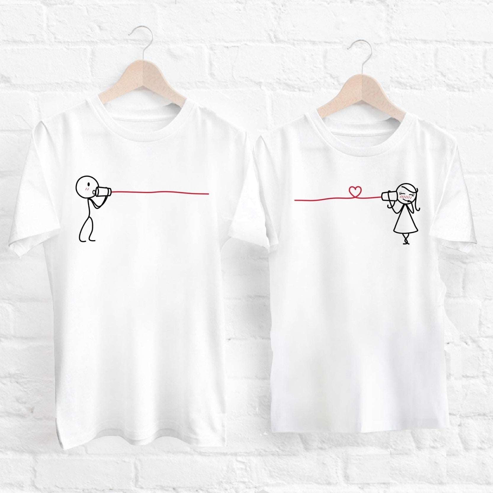 Surprise your loved ones with a pair of artistic white shirts, perfect for couples and as anniversary gifts.