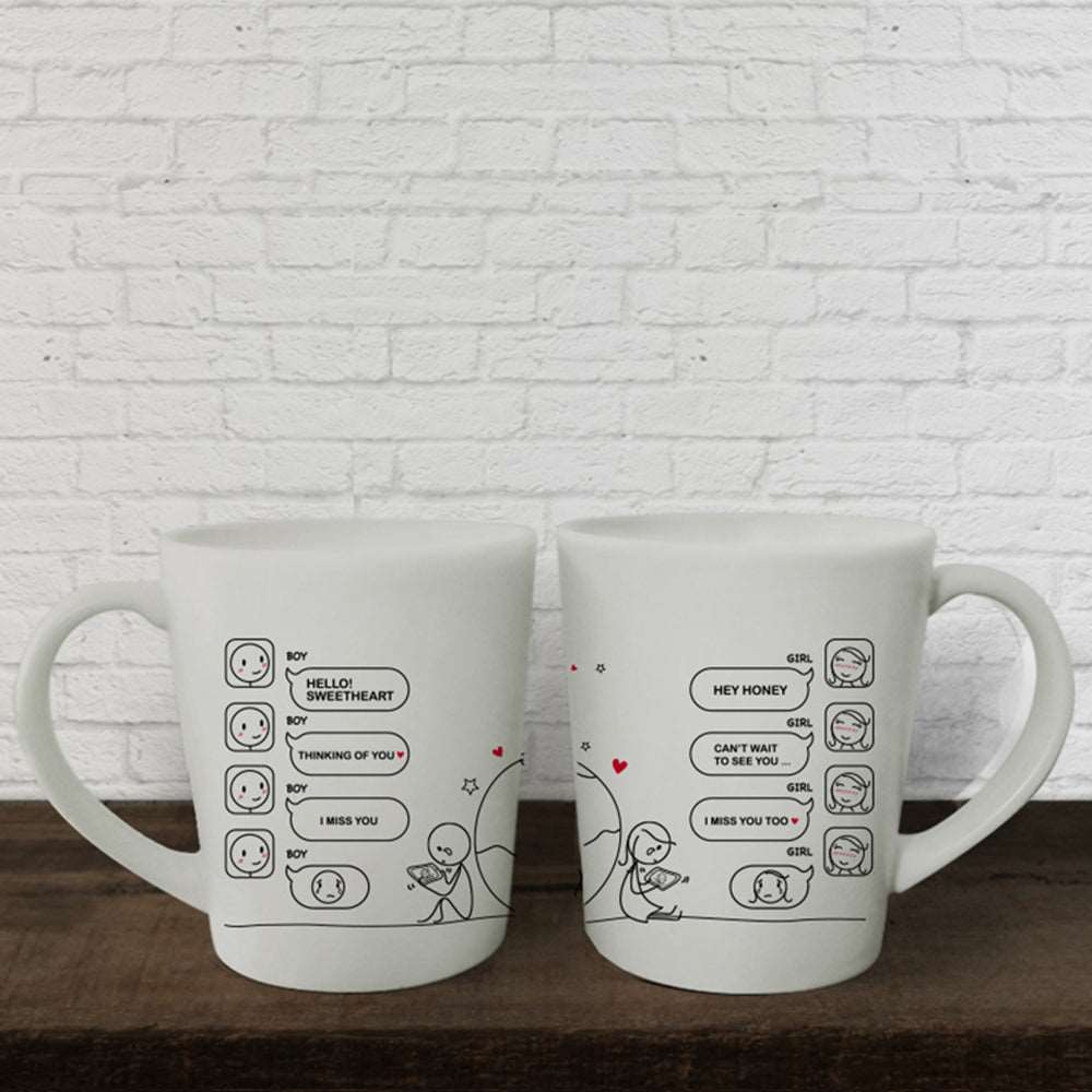 Celebrate love with adorable cartoon characters on two white mugs; a perfect gift for couples, anniversaries, or as a charming surprise for him or her.