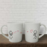 Adorned with charming drawings, these two white mugs create a delightful and thoughtful gift for couples, anniversaries, or as presents for him and her.