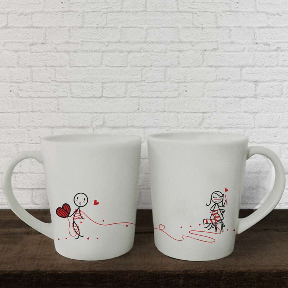 These adorable white mugs feature charming drawings, making them a perfect creative gift for couples or a delightful anniversary gift for him or her.