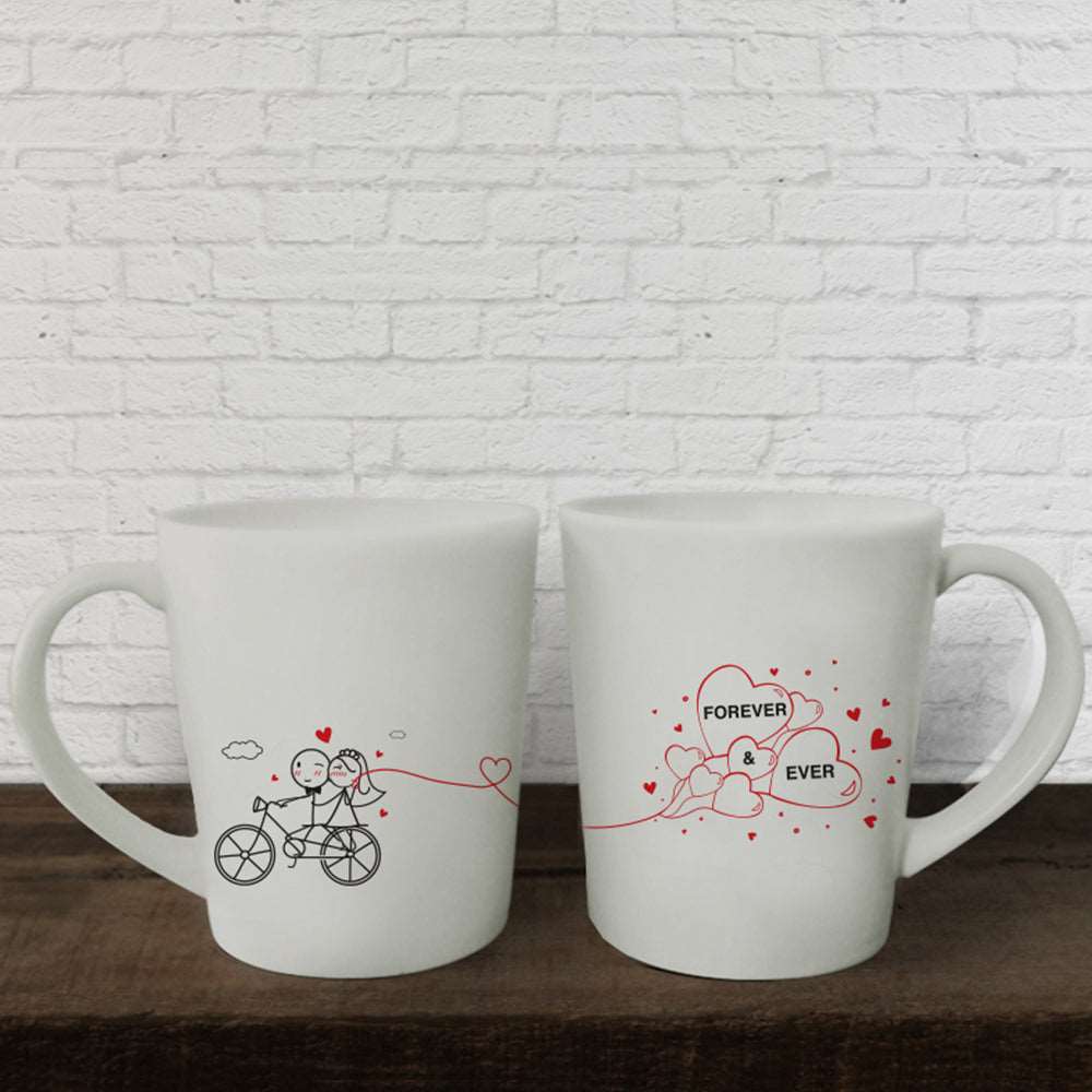 Delightful and charming, these exquisite white mugs feature enchanting hand-drawn designs, perfect for couples celebrating anniversaries or as thoughtful gifts for him or her.