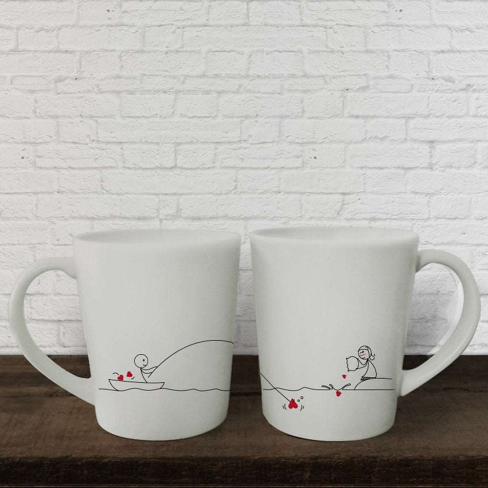 Get these adorable white mugs with a personalized drawing, perfect as a creative gift for couples, anniversaries, and both men and women.
