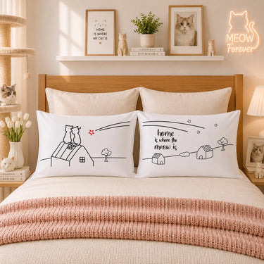 Pair of white pillowcases with black cat doodle and small red heart accents