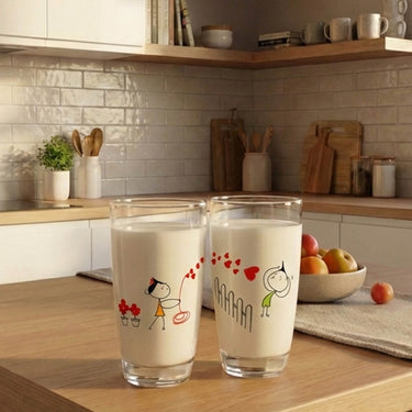 Charming decorative glassware featuring romantic illustrations, perfect as anniversary flower keepsakes.