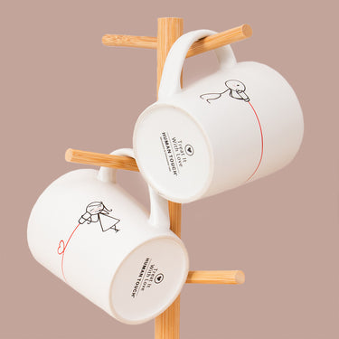 Couples coffee mugs featuring playful designs, perfect anniversary keepsakes for him and her