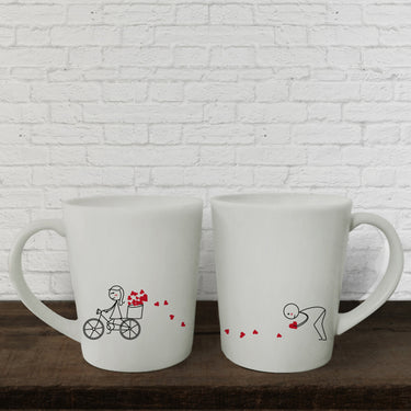 Charming anniversary mugs for couples with playful heart designs, perfect for sharing coffee together in love