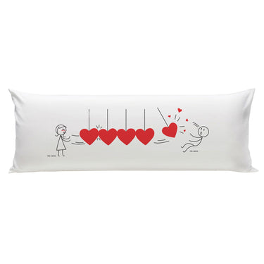 Long pillow for bed featuring anniversary pillow with heart design, perfect for romantic settings