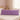 Long pillow for bed in purple with playful designs, ideal as an apology gift for couples