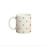 Ceramic coffee mug featuring hearts polka dot design, perfect as a cute and romantic gift for loved ones