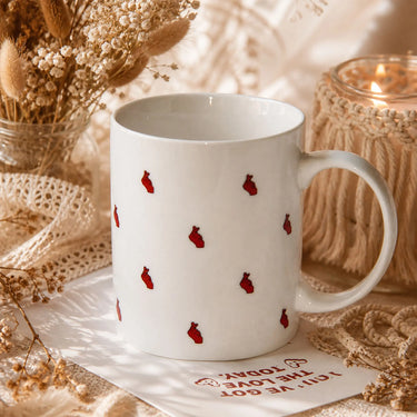 Ceramic coffee mug featuring cute mini heart symbol design, perfect for romantic coffee dates