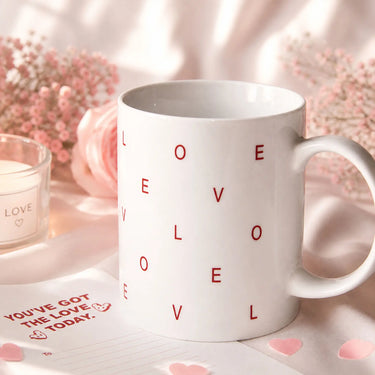 White ceramic coffee mug with 'LOVE' print, perfect romantic gift for shy person to express feelings.