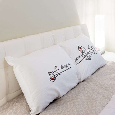 His and hers long pillowcases featuring playful cat designs, perfect as a wedding gift for cat lovers.