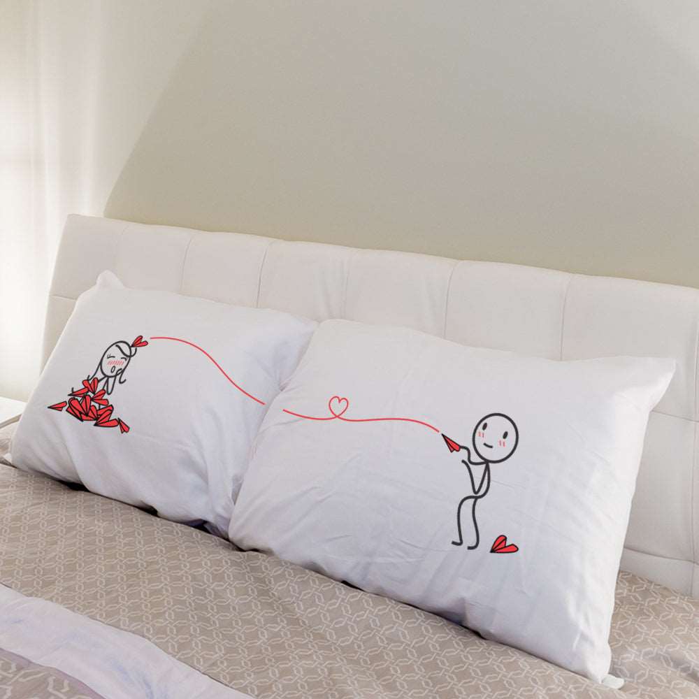 Enhance the ambiance of a cozy bed with an adorable pair of creatively designed pillows, perfect for couples celebrating an anniversary or seeking a delightful gift for him or her.