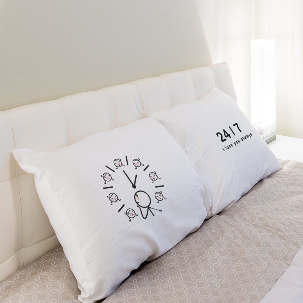 A charming white pillow adorned with a stylish clock, perfect for couples looking for a creative and cute anniversary gift for him or her.