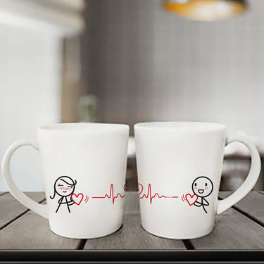 Heartbeat love mugs set featuring cute couple designs, perfect for sharing coffee moments together