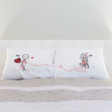 Personalized anniversary gifts his and hers pillowcases featuring a cute couple design with love knots
