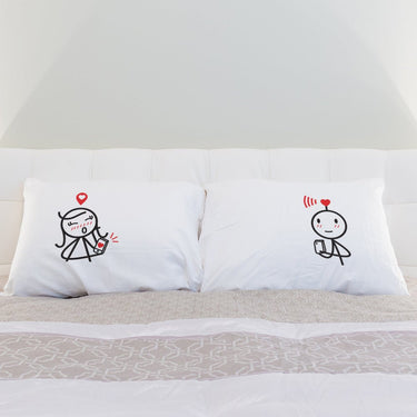 Set of personalized anniversary pillows featuring cute couple designs for his and hers bedding